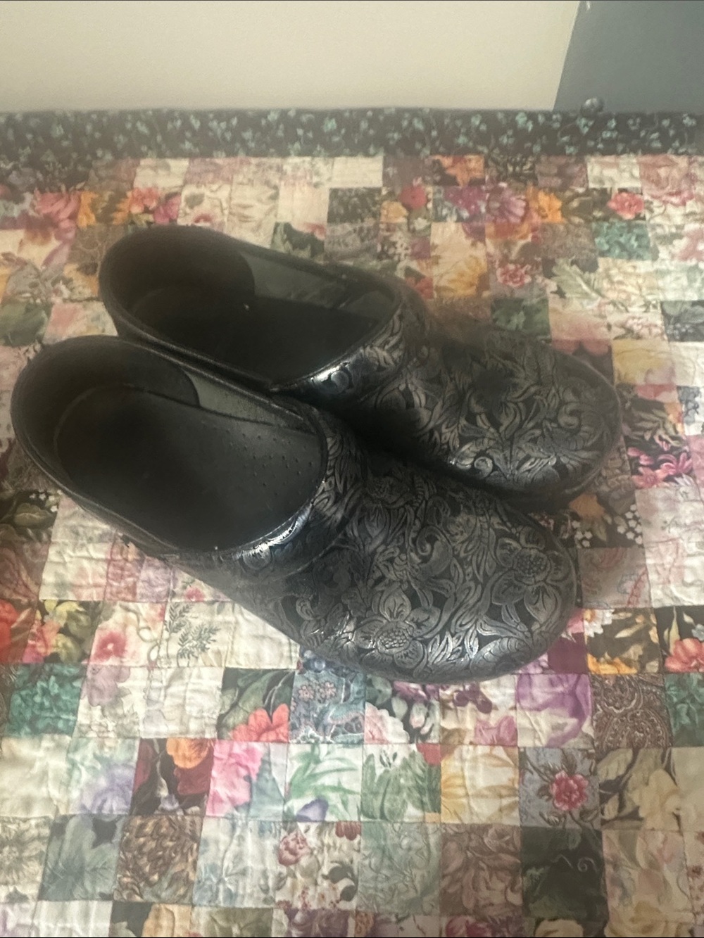 Dansko Black Floral-Embossed Slip-On Clogs